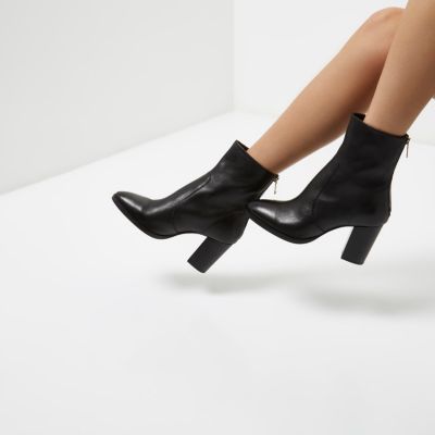 Black leather heeled ankle boots